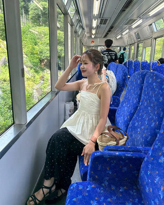 Shoulder ribbon camisole blouse