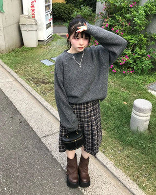 Checked pleated midi skirt
