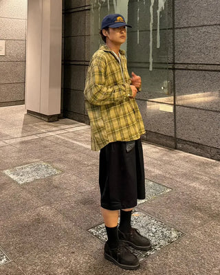 Double-pleated Bermuda shorts