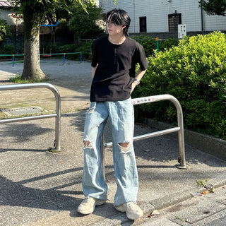 Distressed wide-leg denim pants