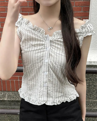 Frilled hem sleeveless blouse