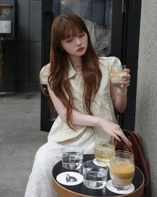Button-up puff-sleeve blouse