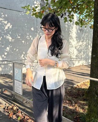 Collarless sheer blouse