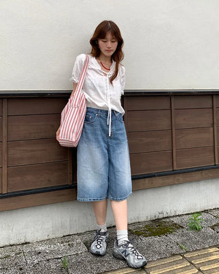 Back-button Bermuda shorts