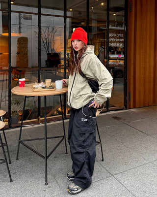 Hooded windbreaker with pockets