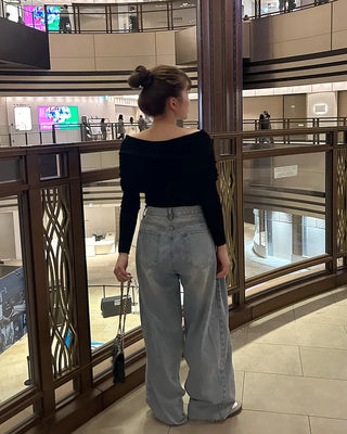 Wide-leg denim with side pleats