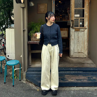Tucked wide-leg pants