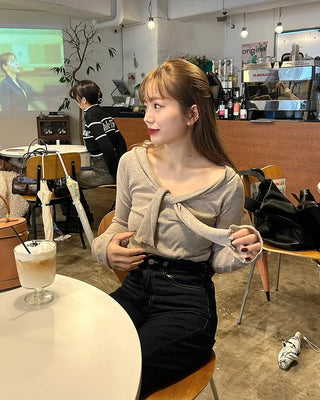 Tie-off shoulder knit