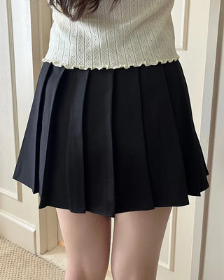 Belted pleated mini skirt