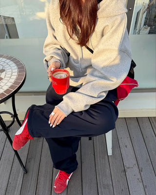 Wide sweatpants with side pockets