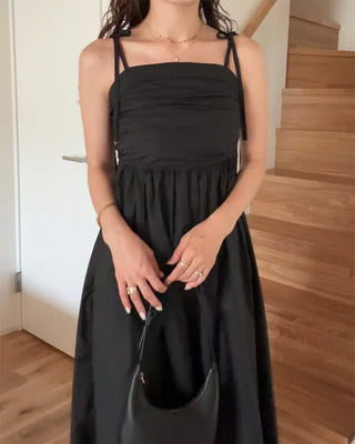 Side-tucked flared long dress