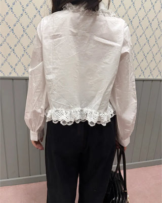 Flower embroidered peplum blouse
