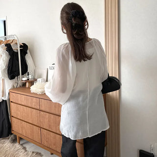Deep V-neck sheer blouse