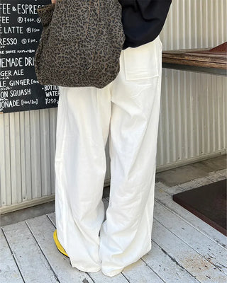 Cotton two-pleat wide-leg pants with key loop.