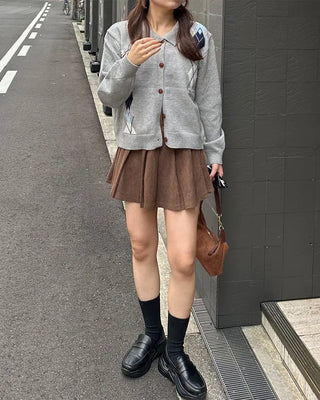 Belted corduroy pleated mini skirt