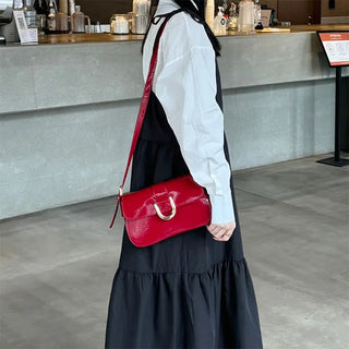 U-buckle shoulder bag