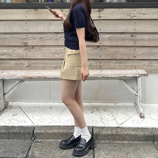 Belted mini skirt with side pockets