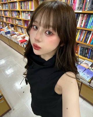 High-neck button-down sleeveless top