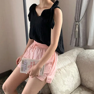 Ribbon sleeveless blouse