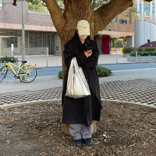 Oversized trench coat with sleeve belt
