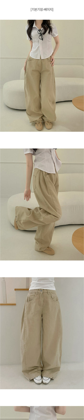 Wide-leg pants with side pleats