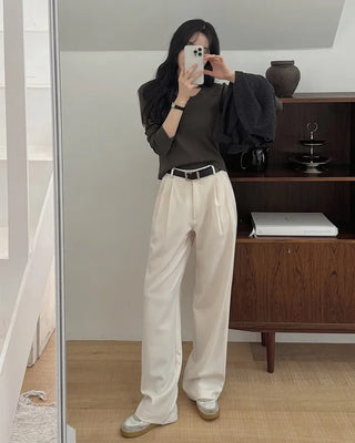 Leg-lengthening pintuck wide slacks