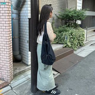 Drawstring pocket shoulder bag