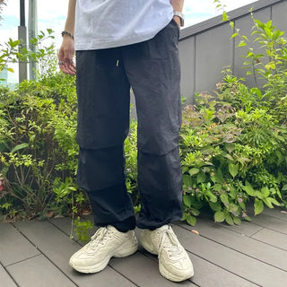 Two-pleat detail string pants