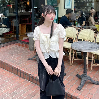Tiered puff-sleeve blouse