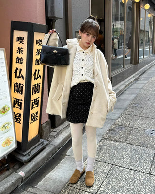 One-button leather handbag