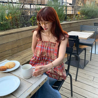 Checked sleeveless blouse