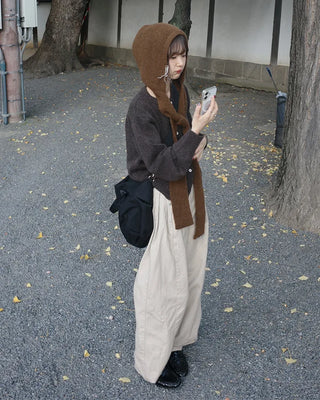 Side-tucked white cotton pants