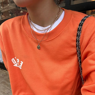 Layered buckle necklace