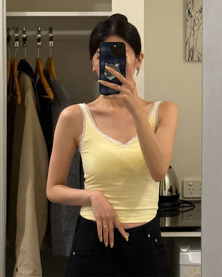 Sleeveless top with lace cap