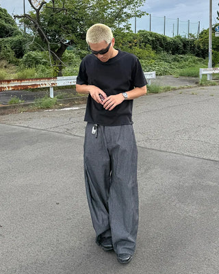 Side-tuck denim slacks