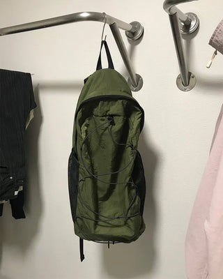Nylon backpack with side pockets