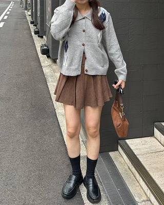 Belted corduroy pleated mini skirt