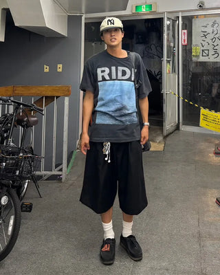 Double-pleated Bermuda shorts