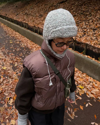 Knit hat with button ear flaps
