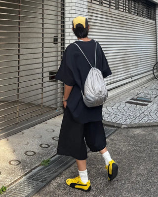 Double-pleated Bermuda shorts