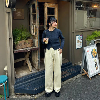 Tucked wide-leg pants