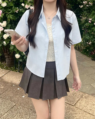 Big pleated mini skirt