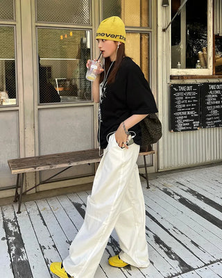 Cotton two-pleat wide-leg pants with key loop.