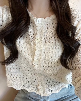 Wave punching cardigan