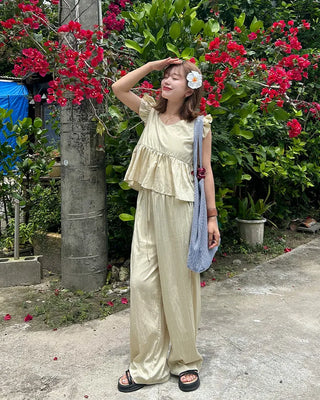 Frilled sleeveless top and wide-leg pants set