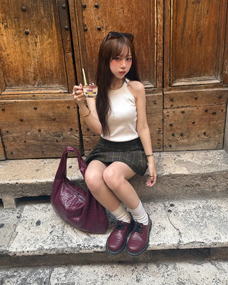 Checkered button pleated mini skirt