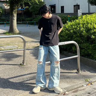 Distressed wide-leg denim pants