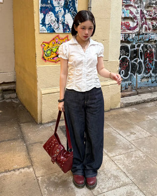 Square studded shoulder bag