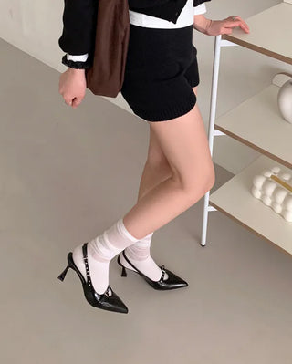 Pointed-toe stiletto slingback heels