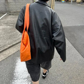 Faux leather mid-length coat